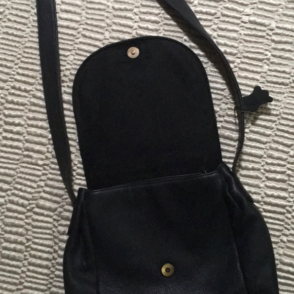 Black leather purse. Four separate pockets. Magnetic closure. 10”x11” - Picture 3 of 5